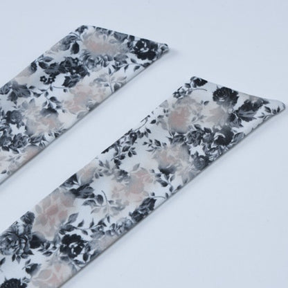 Eleganter, rückenfreier, schmal geschnittener, bedruckter Strampler