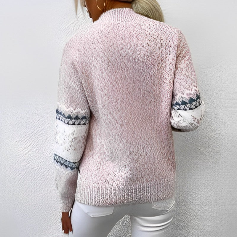 Pull de Noël conçu en forme de flocon de neige