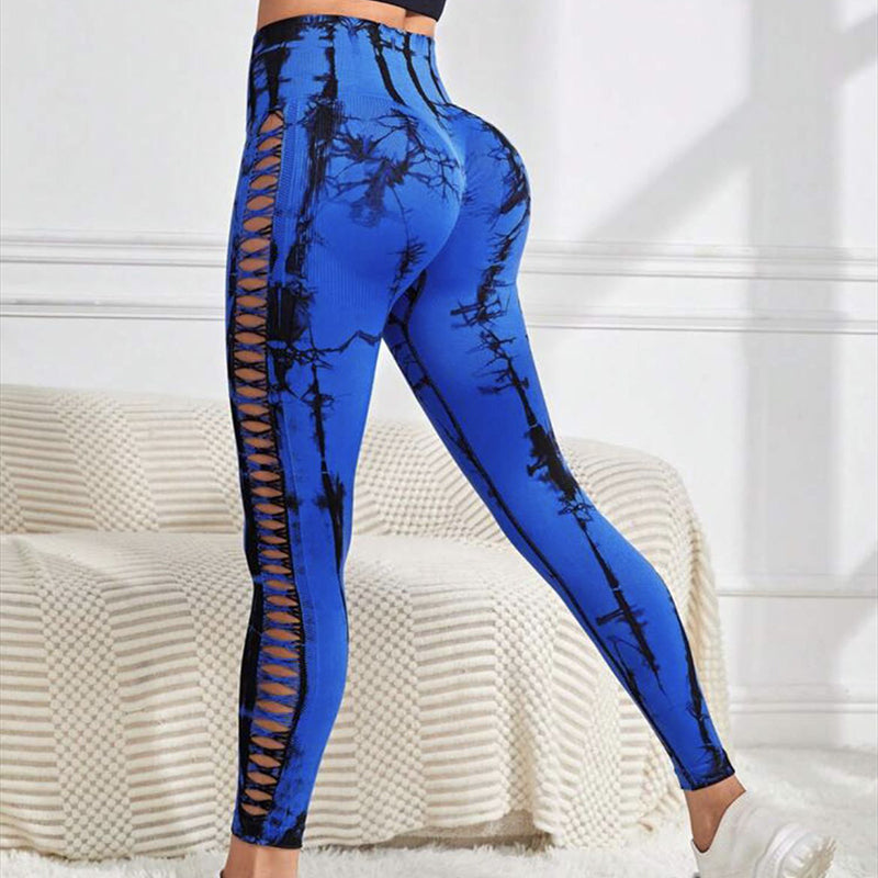 Stilvolle nahtlose Leggings mit hohlem Tie-Dye-Print