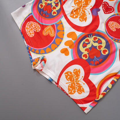 Eleganter, rückenfreier, ärmelloser bedruckter Strampler